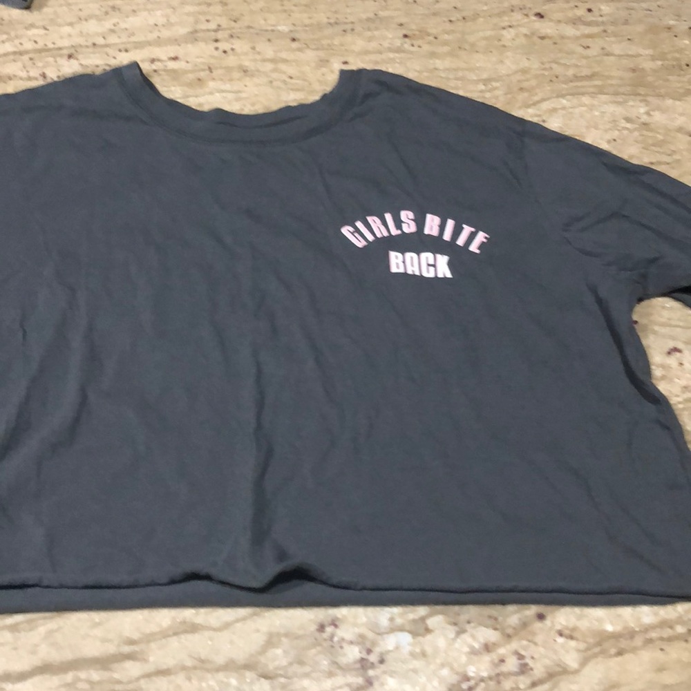 Never worn.cropped long sleeve shirt that is gray